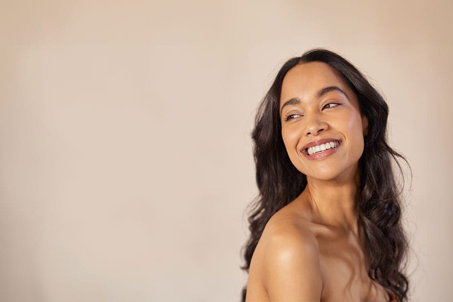 a smiling woman after she gets semaglutide weight loss in Fort Myers, Florida